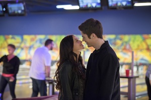 Malese Jow as Linda Park and Grant Gustin as Barry Allen share a moment at the bowling alley together 